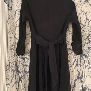 Falls just above the knee. Perfect with textured tights and booties.